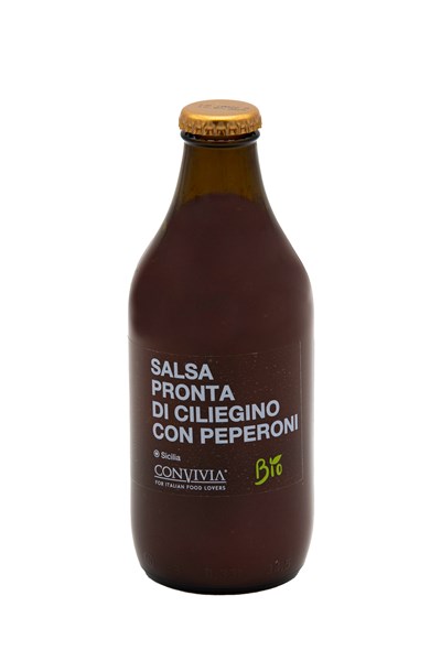 Glasflasche mit Bio-Kirschtomaten-Pfeffer-Sauce